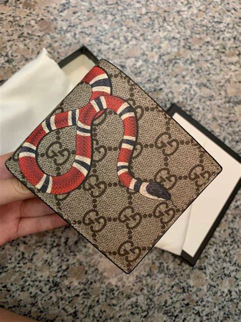 how to tell if gucci is real wallet|authentic gucci snake wallet.